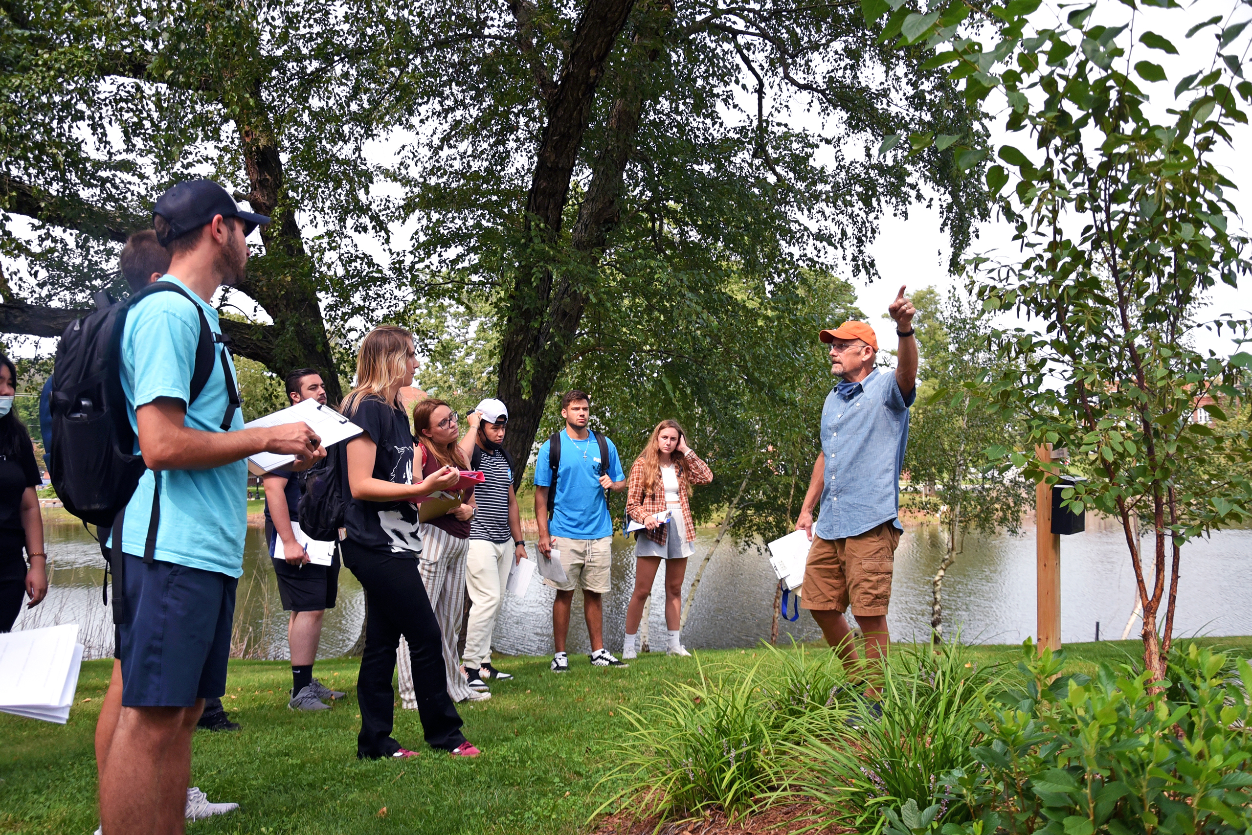 tree identification class outside near Swan Lake.
