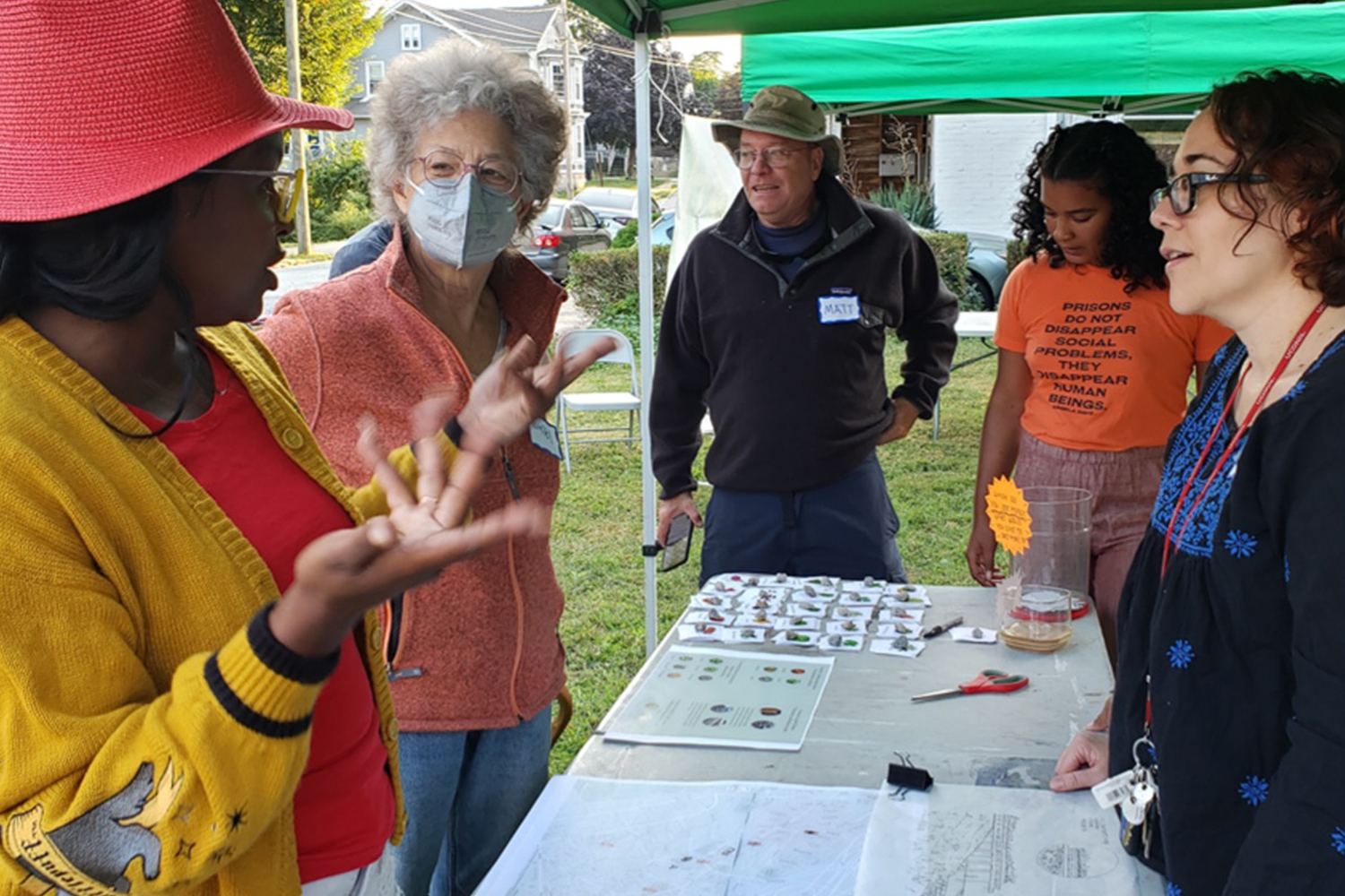 group of people discussing LA design at an outdoor event
